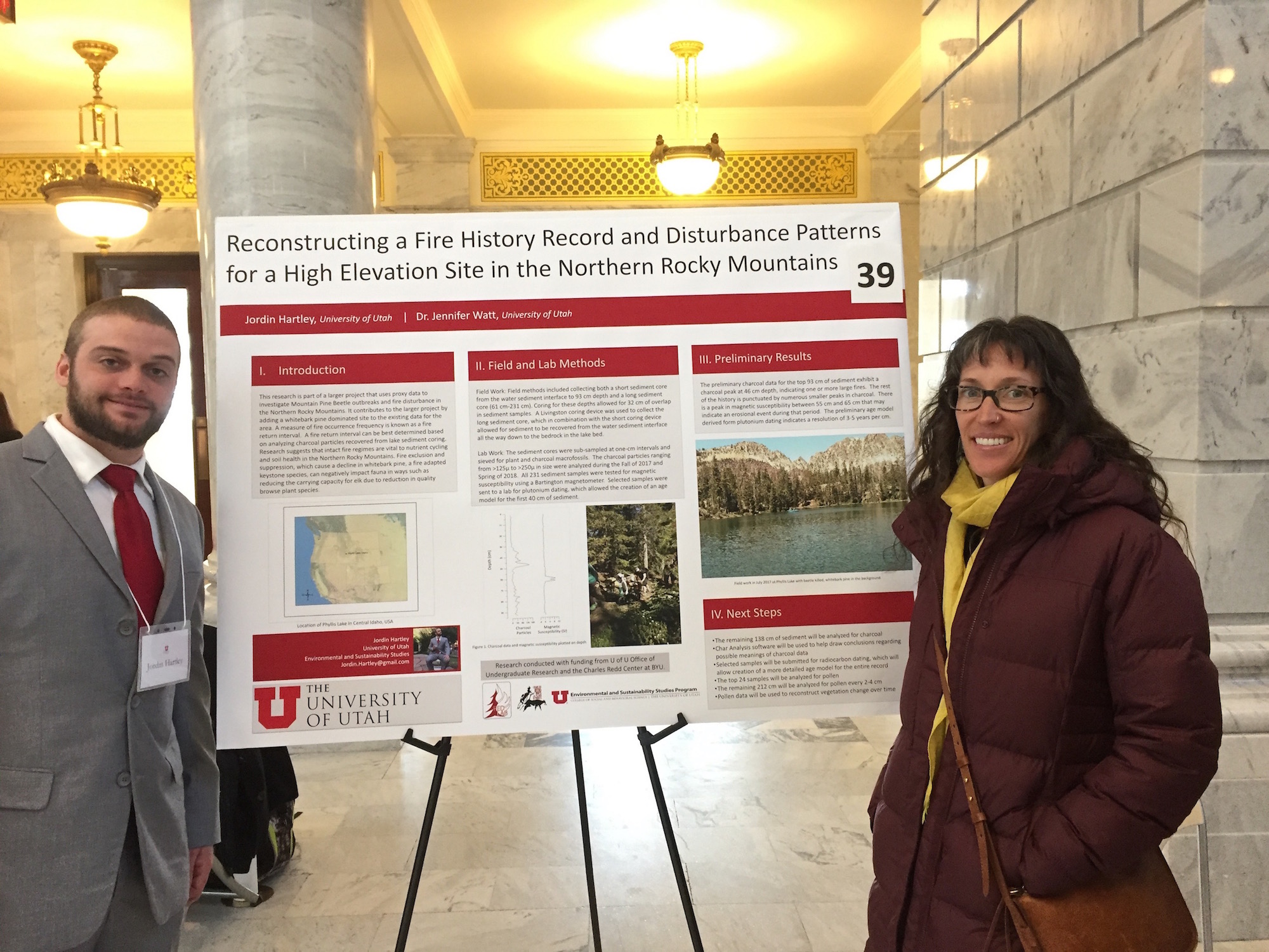 Jordin Hartley in front of research poster